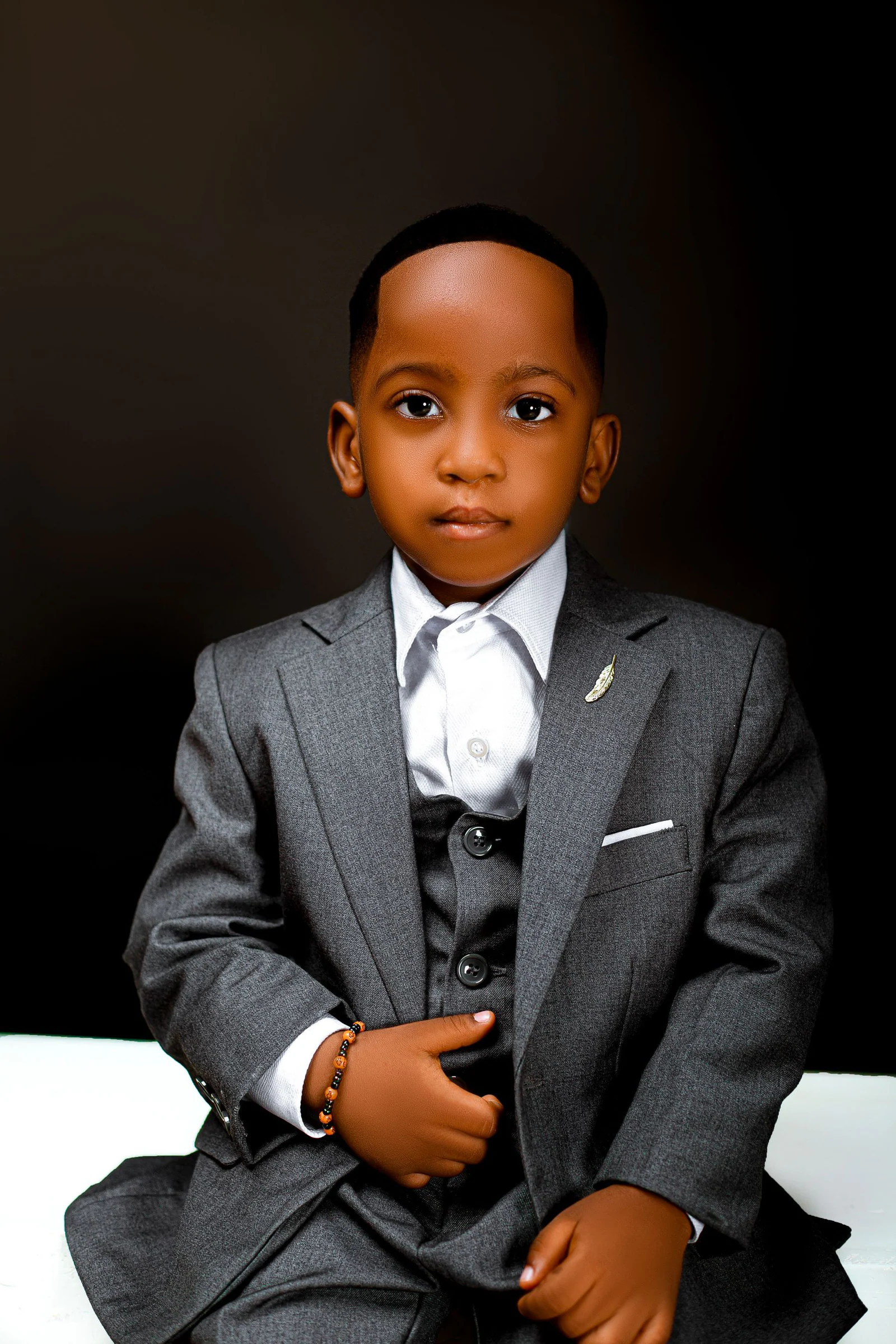 Elegant portrait of a young boy in suit