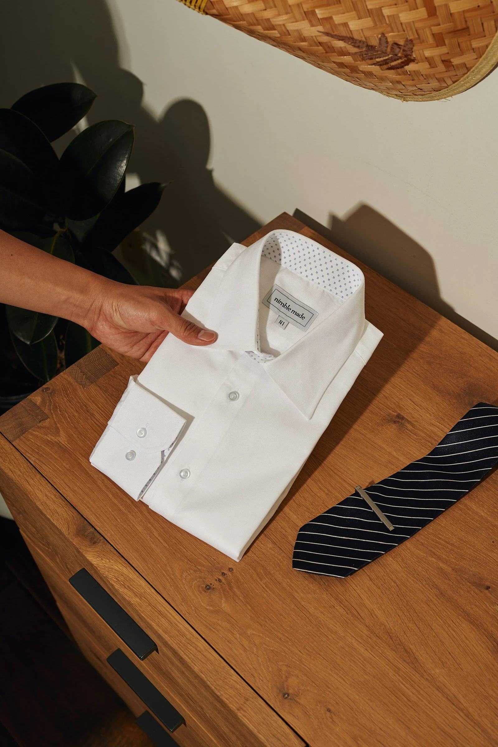 White shirts on brown wooden table