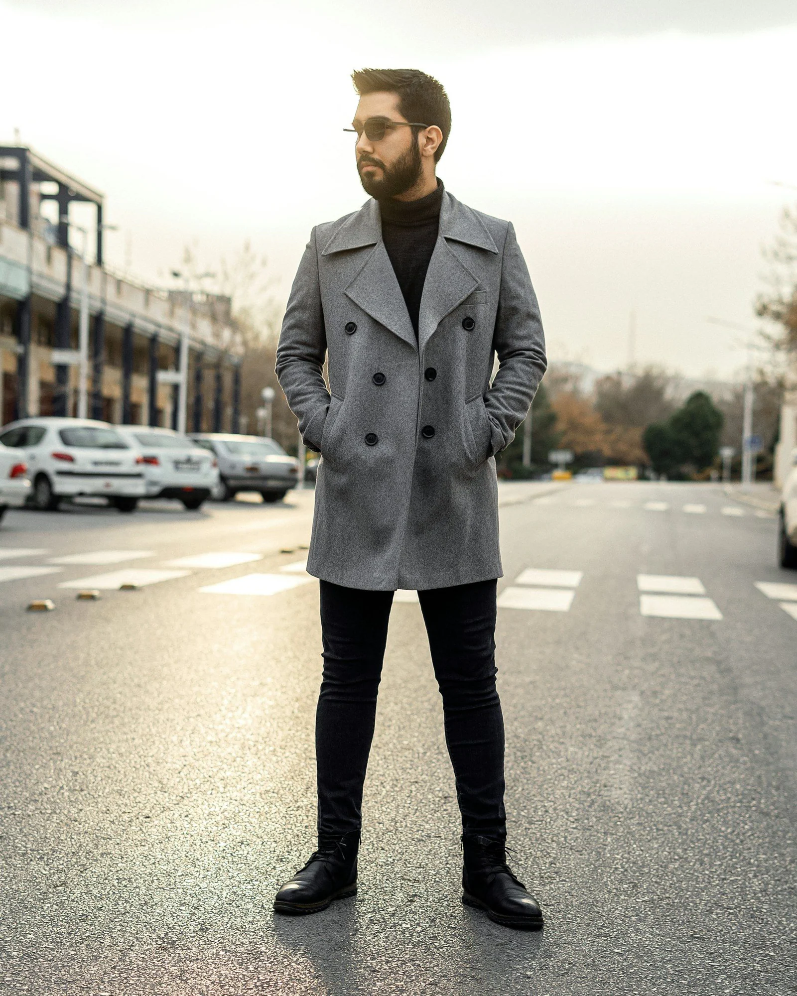 A man standing in the middle of a street