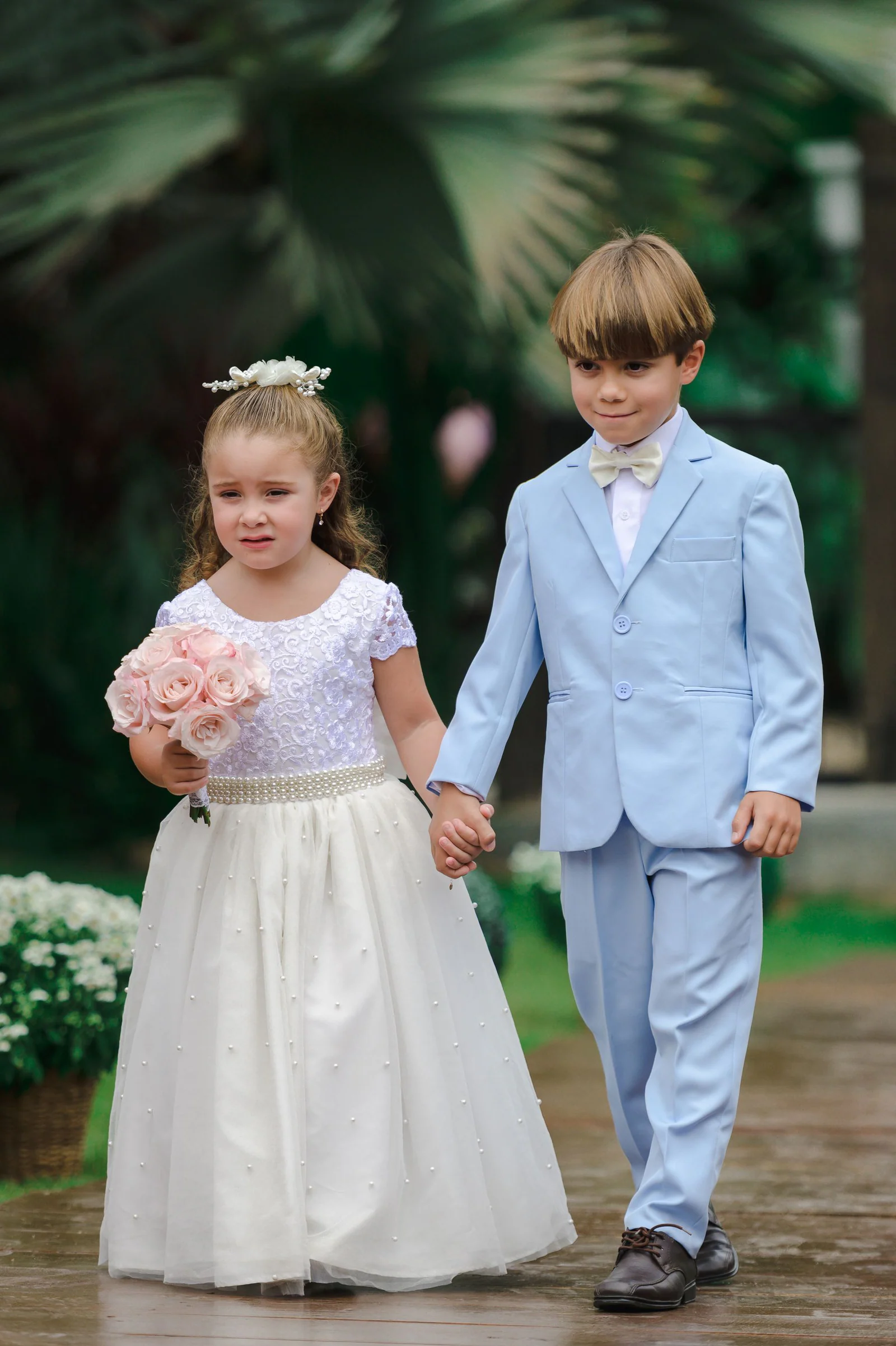 Girl and boy on wedding in elegant clothing
