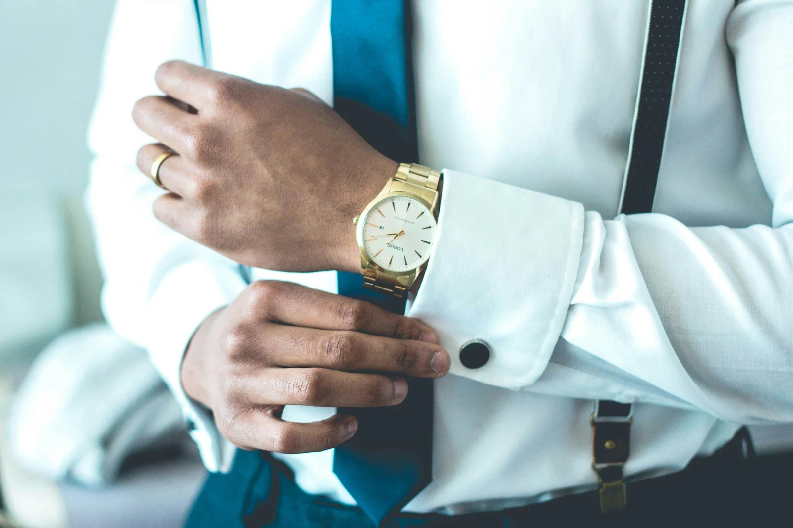 Person wearing white dress shirt