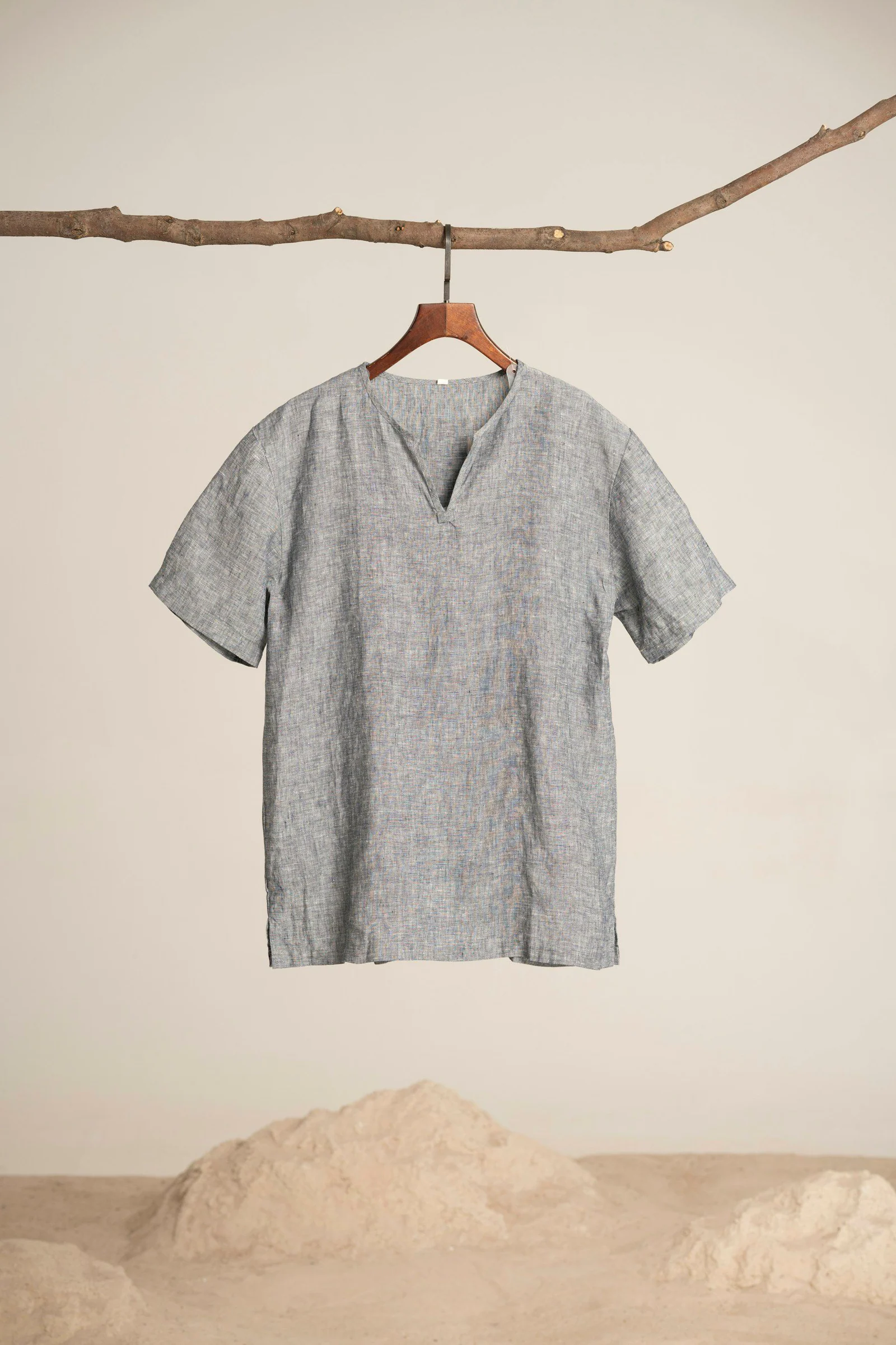 A t shirt hanging on a clothes line