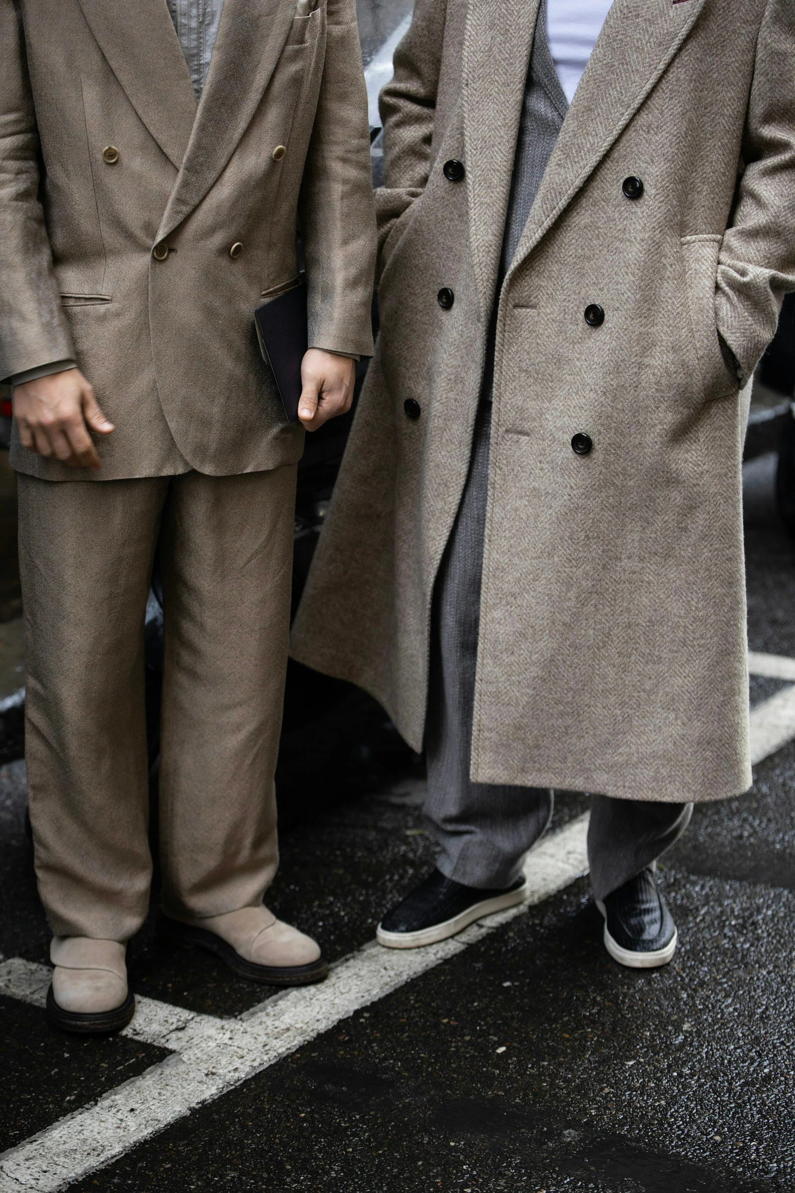 A couple of men standing next to each other
