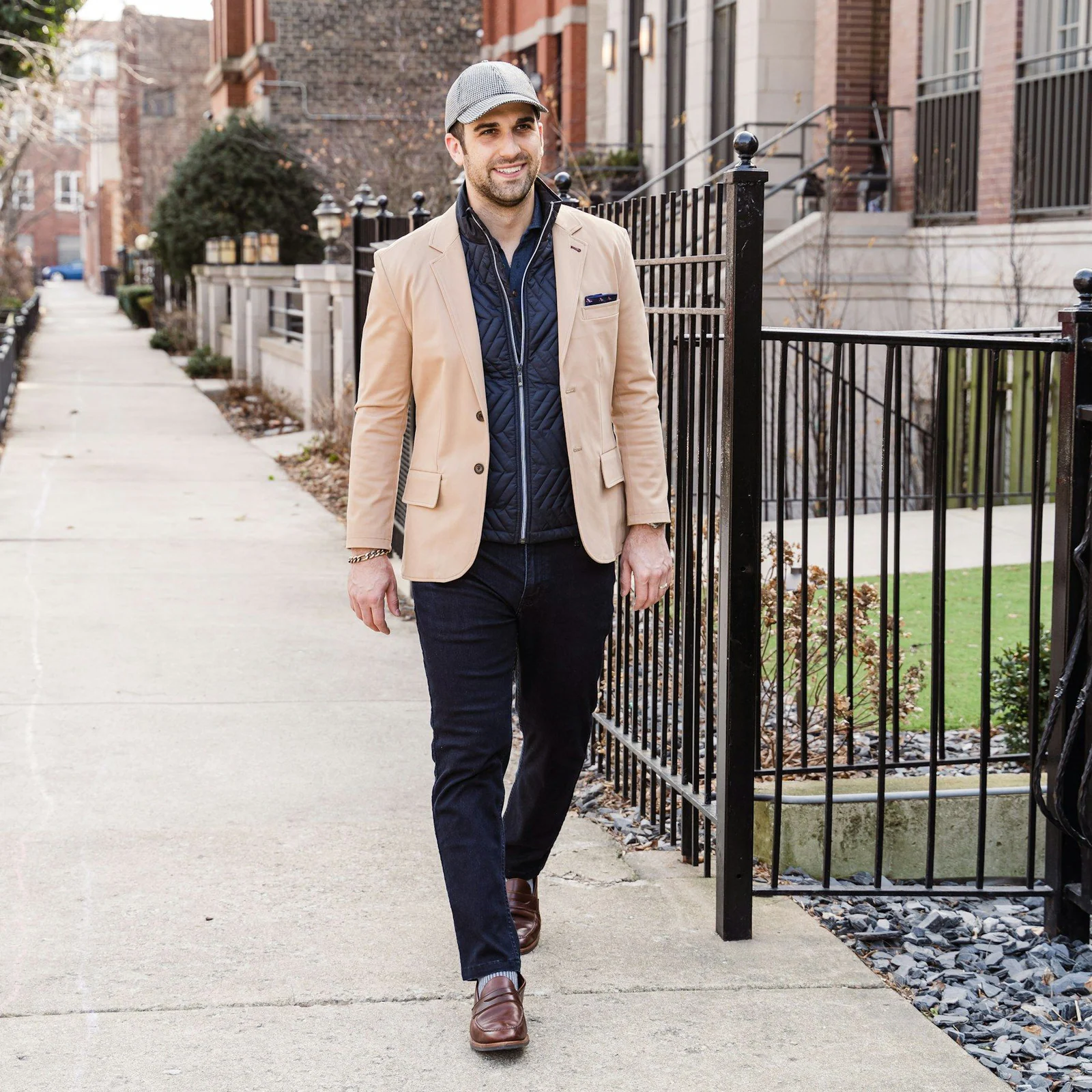 A man standing on a sidewalk