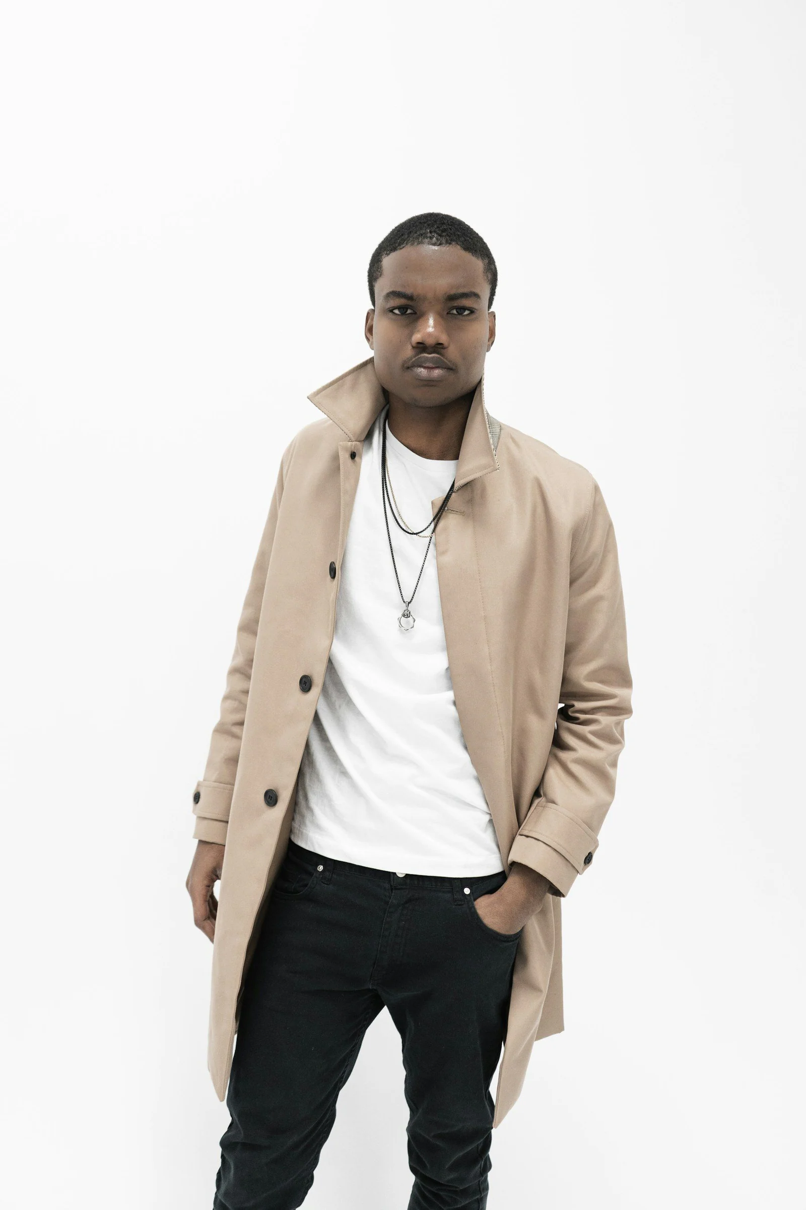 Men's white crew neck shirt and pink overcoat