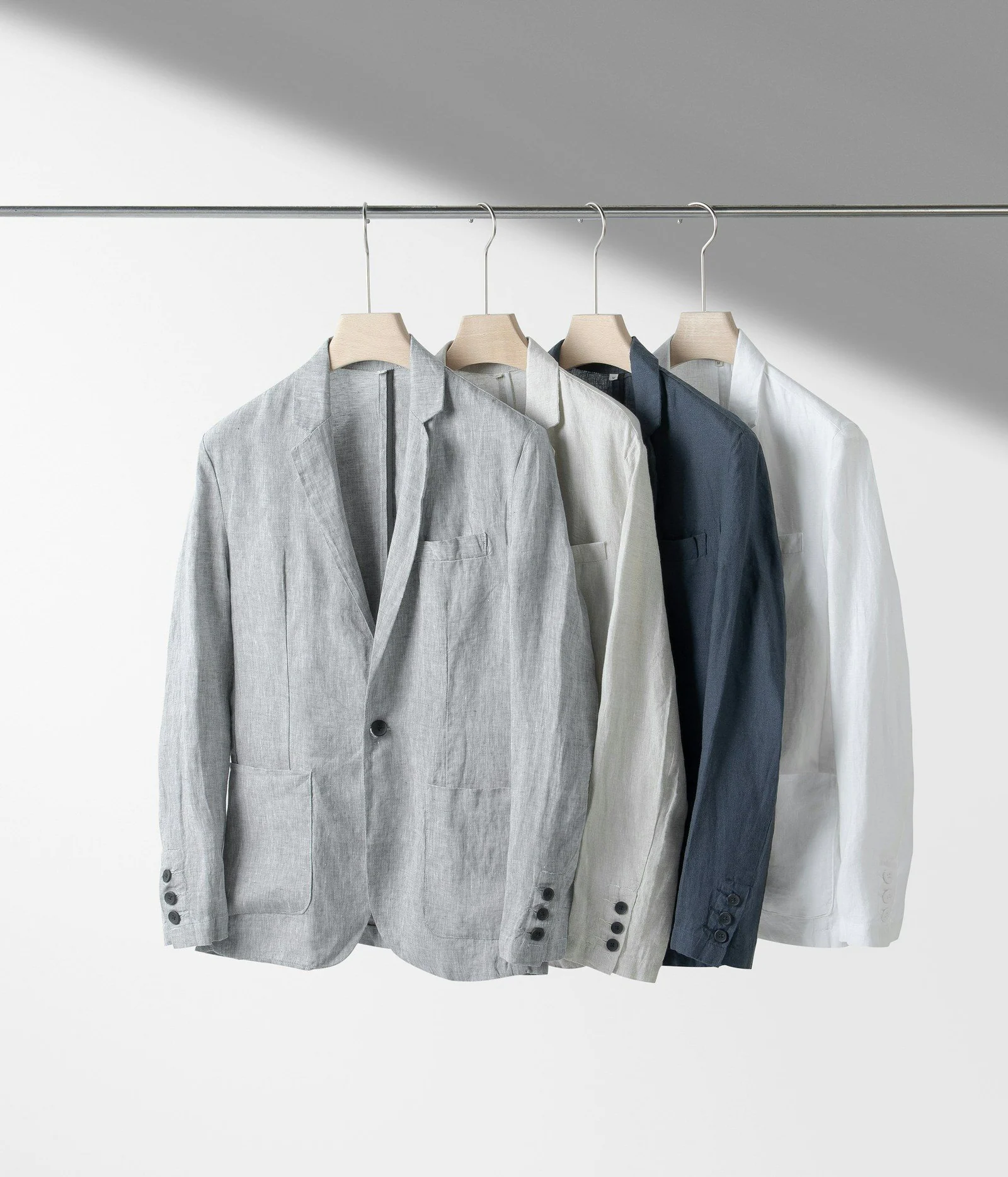A row of shirts hanging on a clothes line