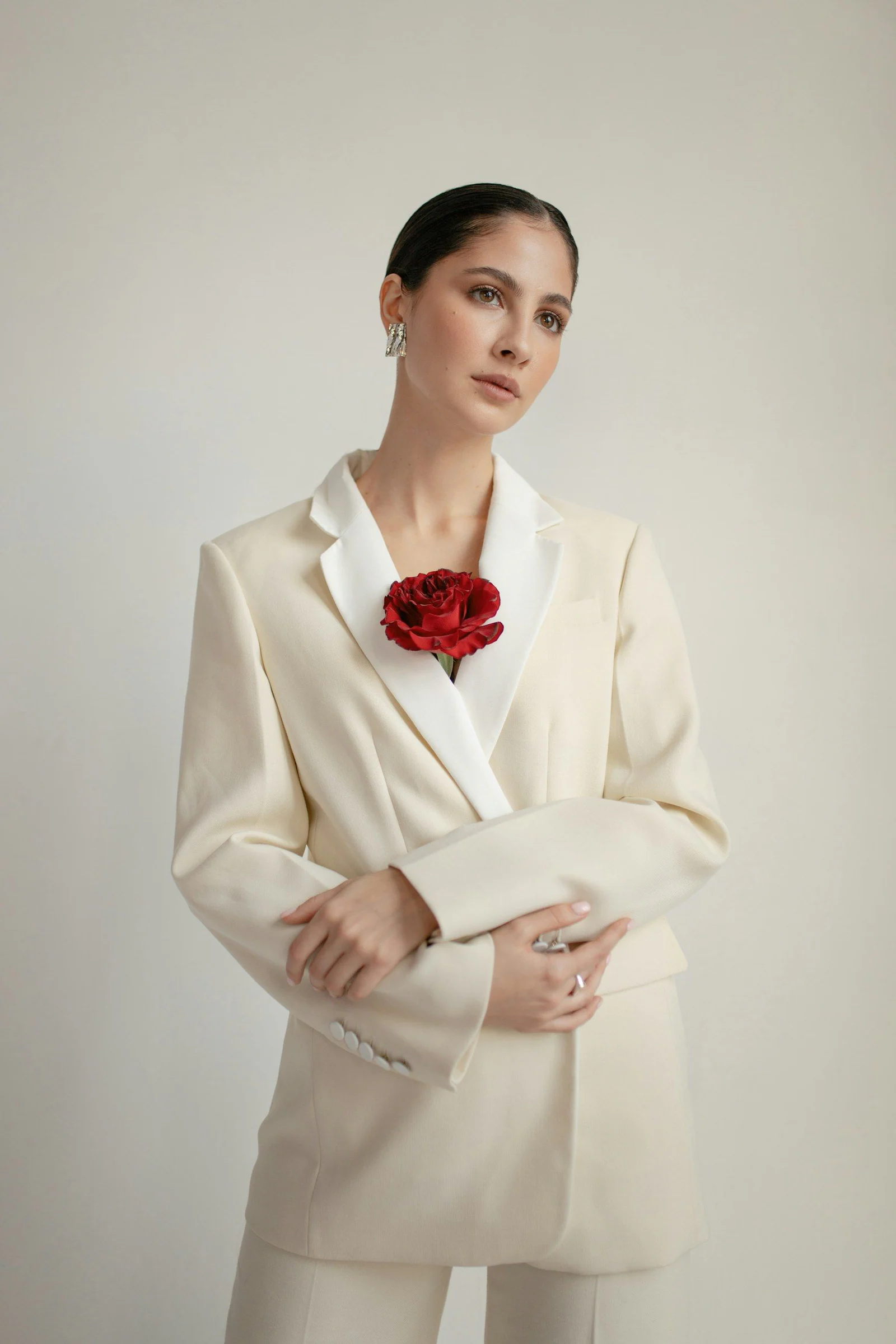 Woman wearing white blazer