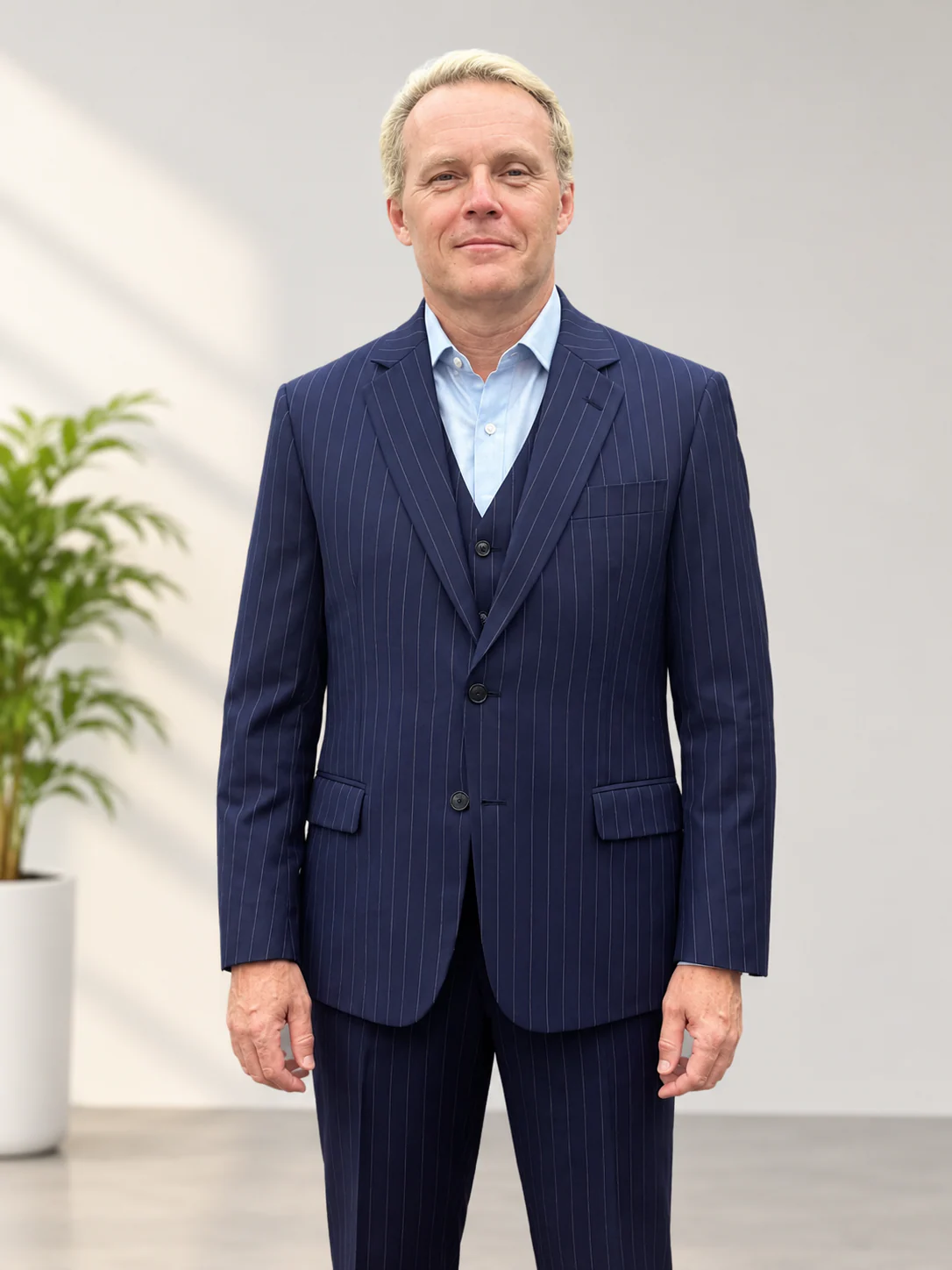 Navy pinstripe three-piece suit