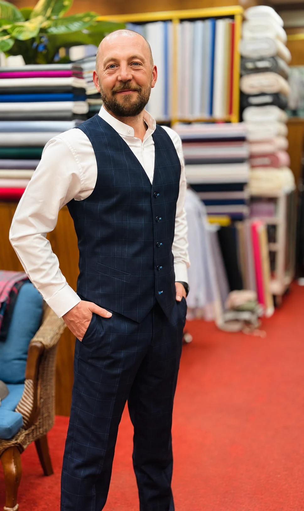 Navy check waistcoat, hands in pockets