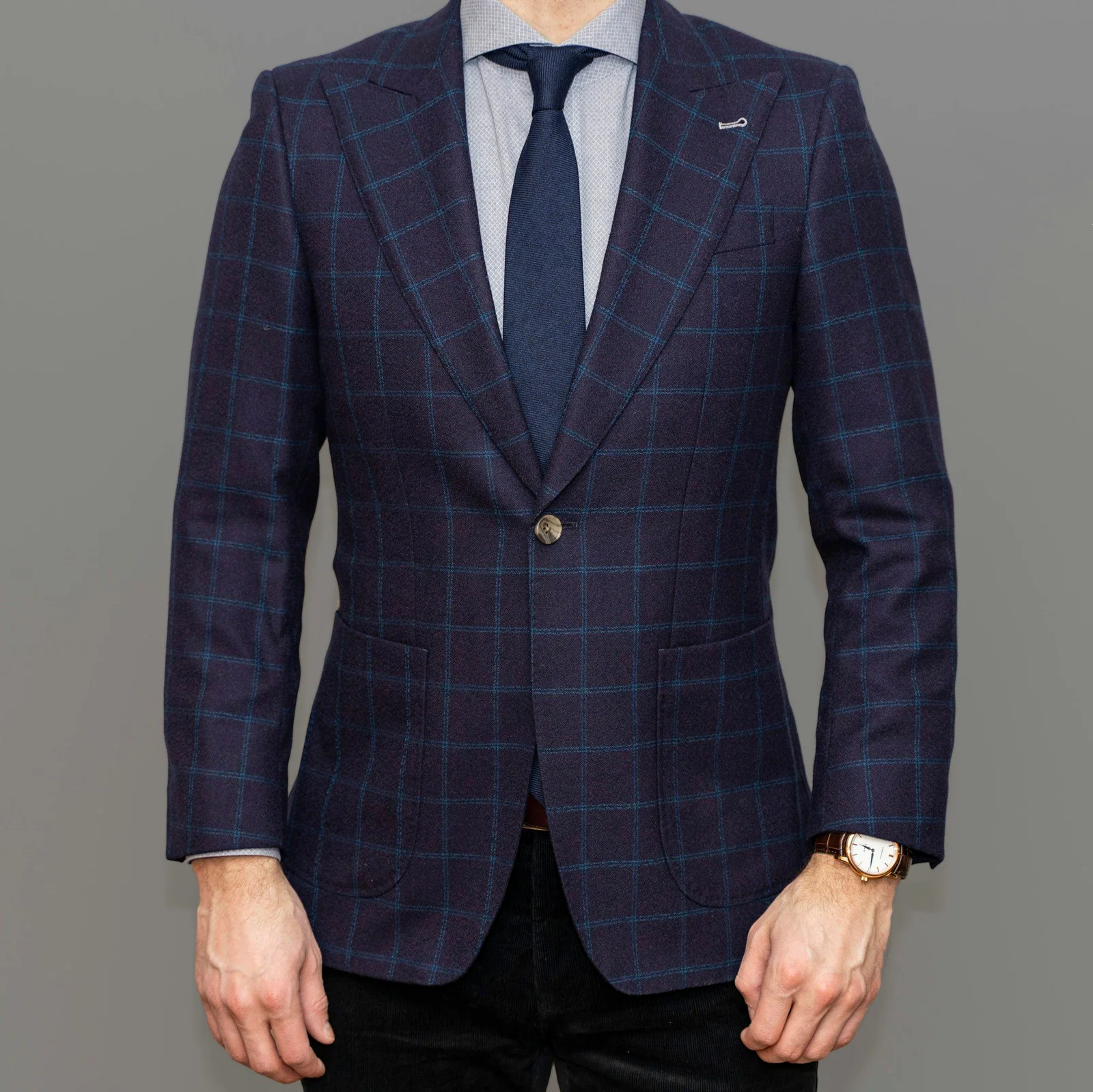 Bespoke navy check jacket and tie