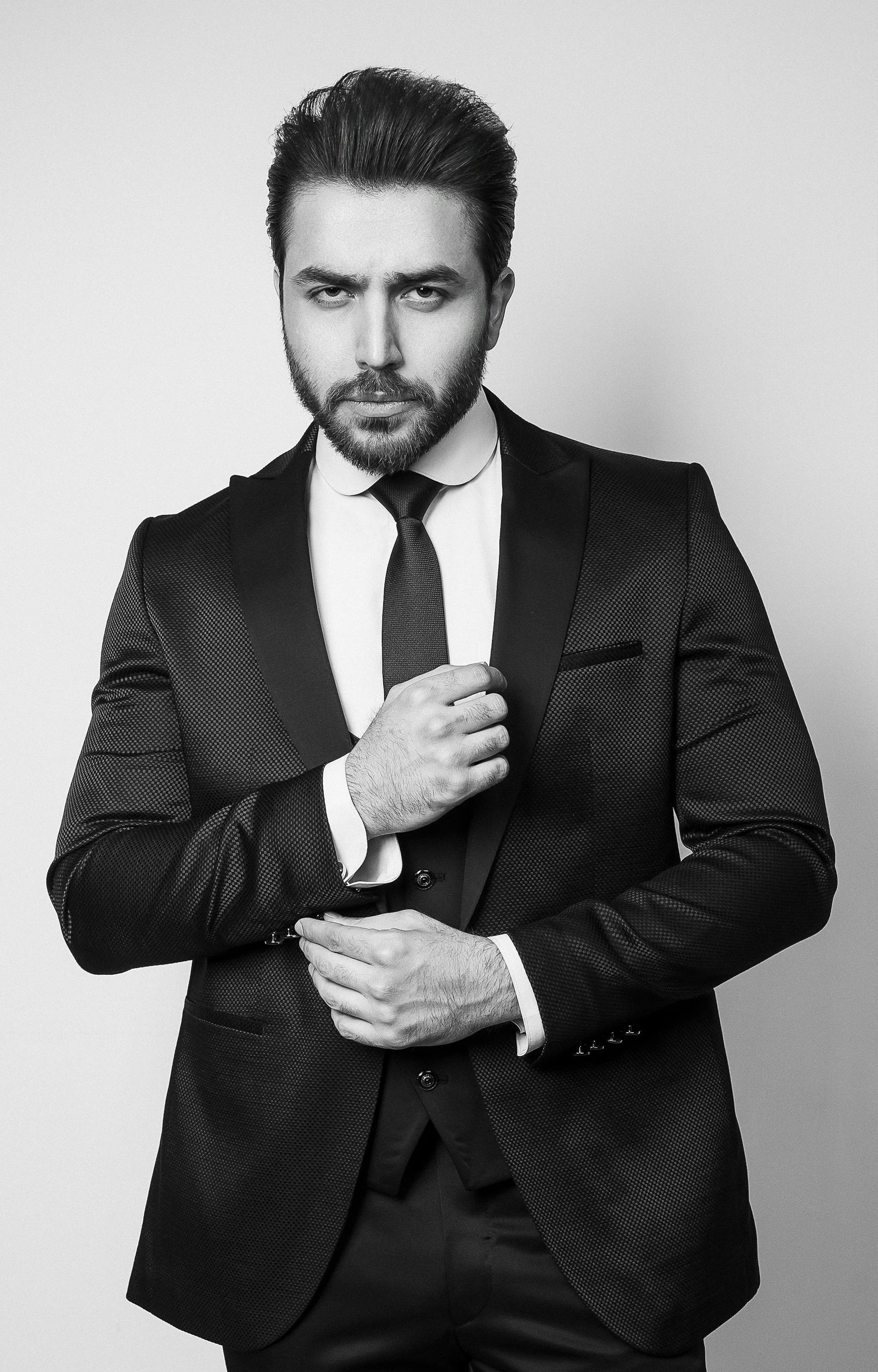 Black formal suit and tie, black and white portrait