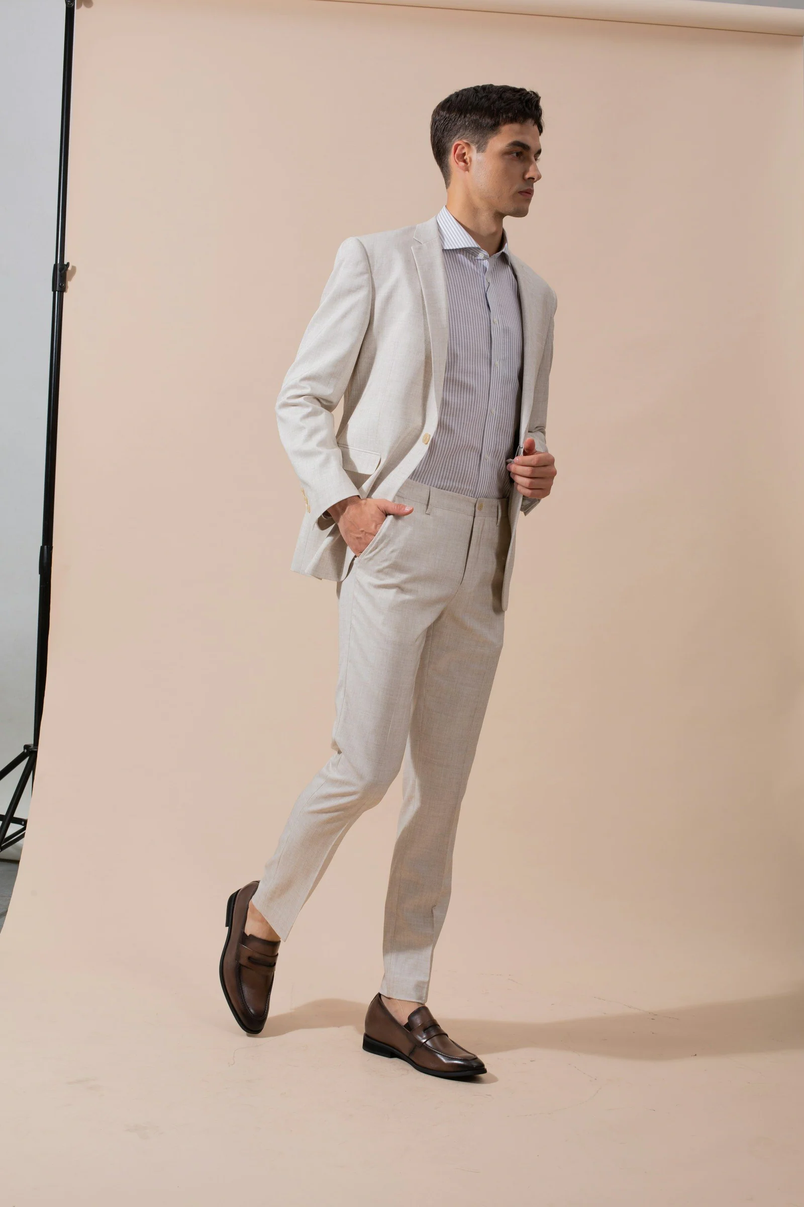 Light summer suit, full length in the studio