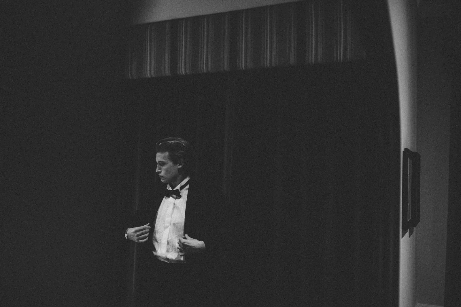 Dinner suit in a dramatic dark setting